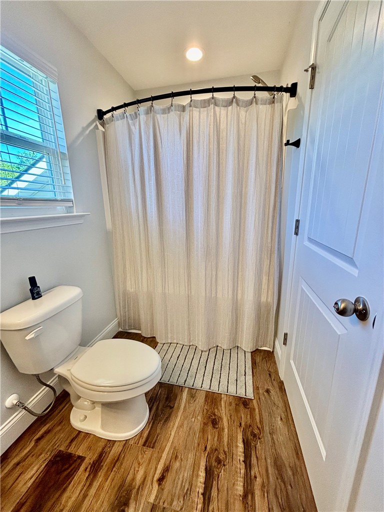 248 Inlet Pointe Drive Anderson, SC 29625 - Photo 30 of 42 This bathroom features durable flooring, a convenient window, and a functional shower area.