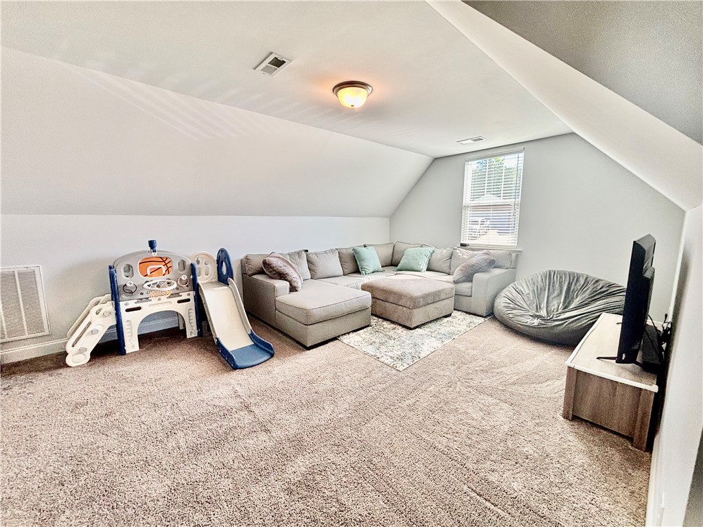 248 Inlet Pointe Drive Anderson, SC 29625 - Photo 31 of 42 This versatile bonus room could be easily used for the 5th bedroom for the big family or it would make the perfect playroom.