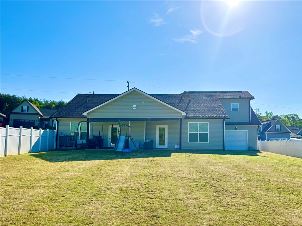 248 Inlet Pointe Drive Anderson, SC 29625 - Photo 36 of 42 This residence features a fenced private yard with a covered patio, perfect for outdoor enjoyment.