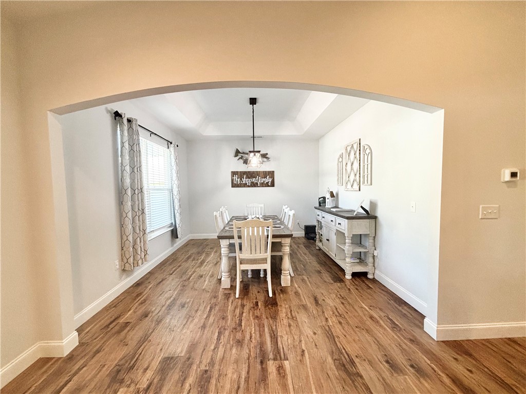 248 Inlet Pointe Drive Anderson, SC 29625 - Photo 4 of 42 This dining room offers an inviting atmosphere with natural light and elegant architectural details.