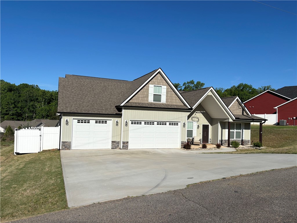 248 Inlet Pointe Drive Anderson, SC 29625 - Photo 42 of 42 This charming home offers a spacious driveway and convenient garage access, perfect for comfortable living.