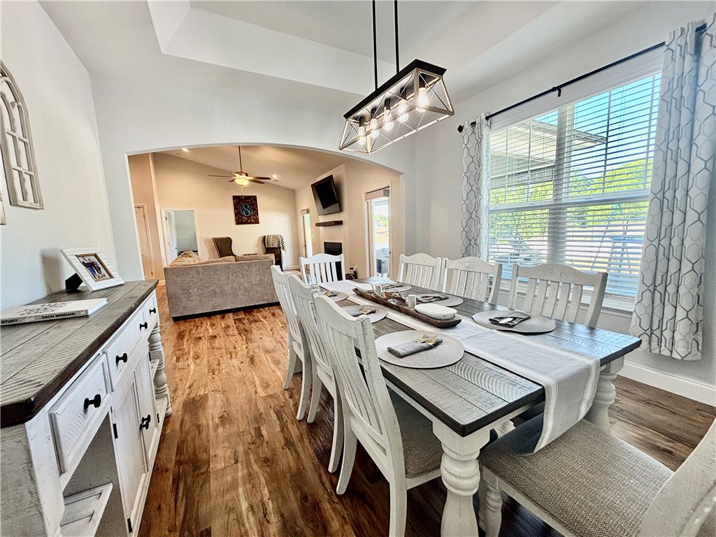 248 Inlet Pointe Drive Anderson, SC 29625 - Photo 8 of 42 This inviting dining room with hardwood flooring seamlessly transitions into the living area.