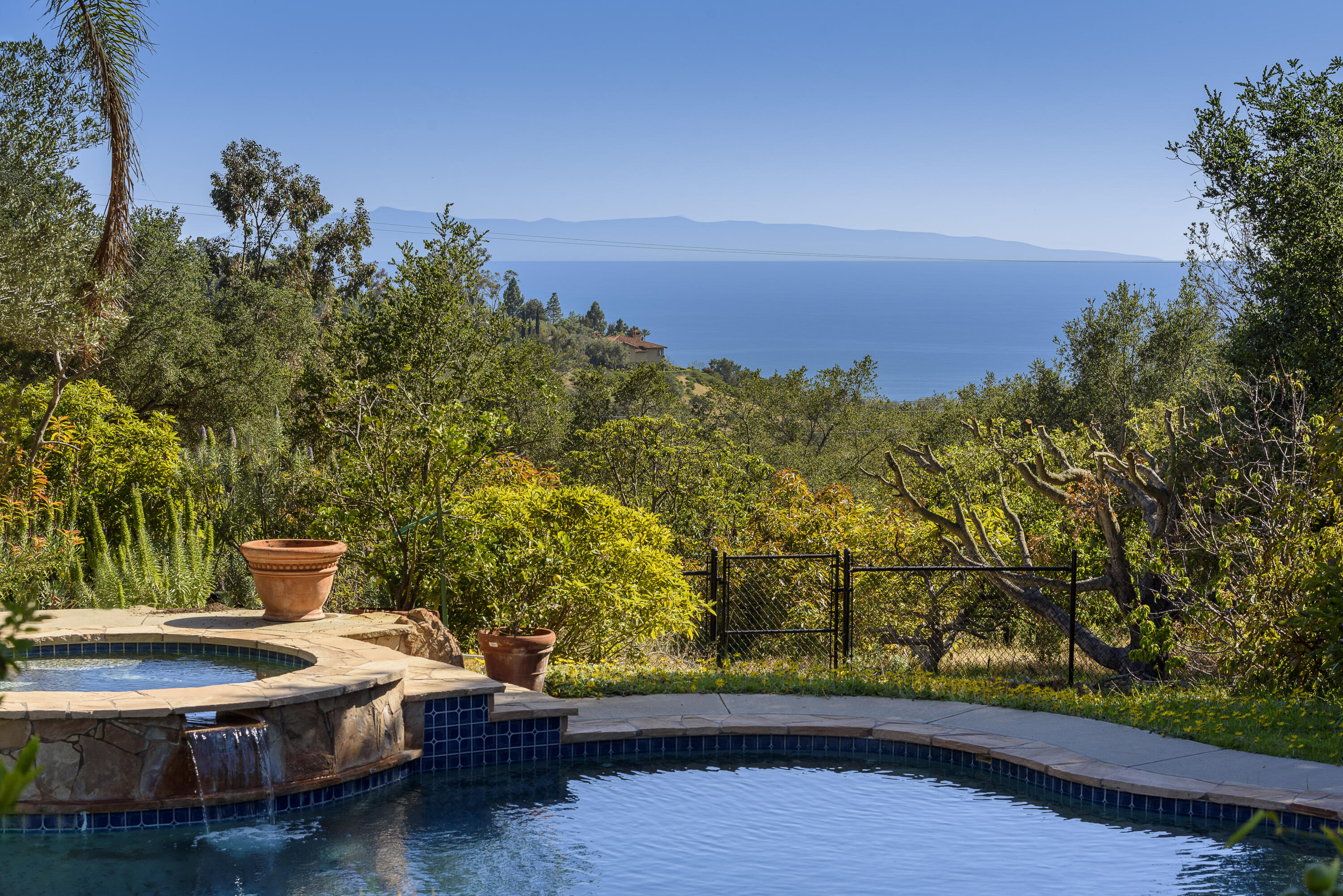 1040 Ladera Lane Montecito, CA 93108 - Photo 15 of 18 a view of balcony with two chairs and a table