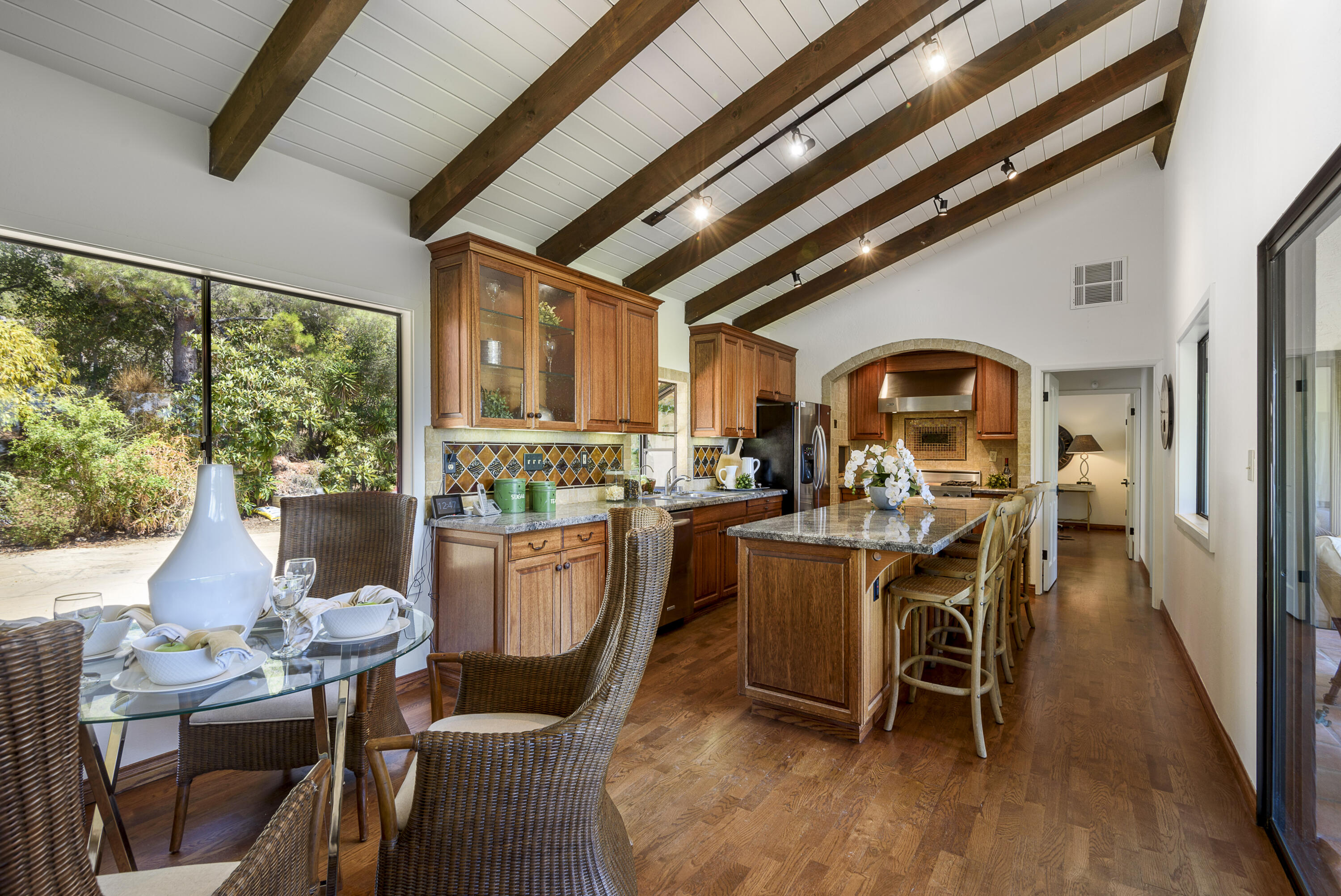 1040 Ladera Lane Montecito, CA 93108 - Photo 4 of 18 a dining room with furniture window and wooden floor