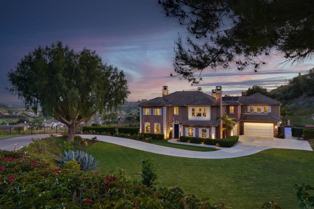 a view of a house with a big yard