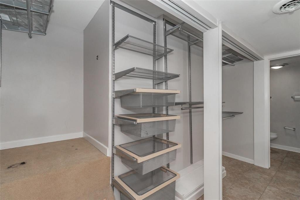 4930 Thunder Road Dallas, TX 75244 - Photo 23 of 23 Adjustable wire shelving system with integrated wire mesh drawers and hanging rods