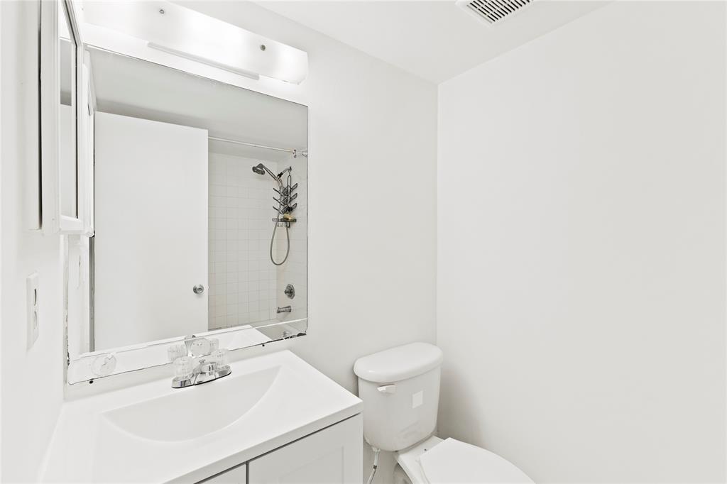 3199 Foxcroft Road, Unit 304 Miramar, FL 33025 - Photo 14 of 23 a bathroom with a sink a toilet and shower