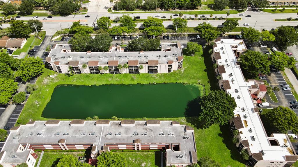 3199 Foxcroft Road, Unit 304 Miramar, FL 33025 - Photo 20 of 23 an aerial view of multiple house