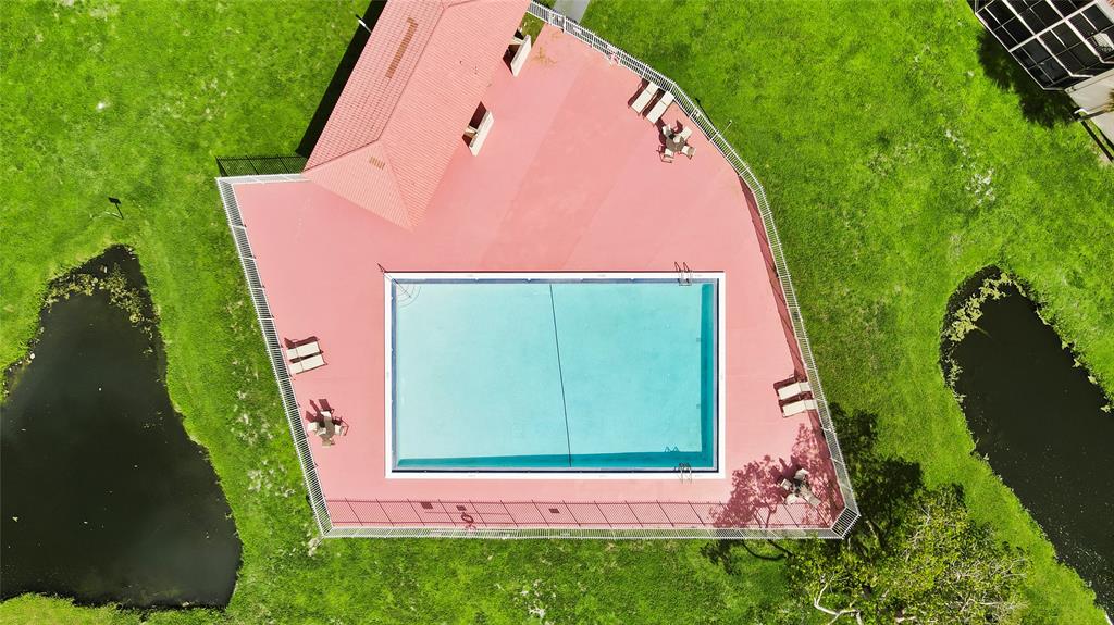 3199 Foxcroft Road, Unit 304 Miramar, FL 33025 - Photo 23 of 23 a view of a backyard with potted plants