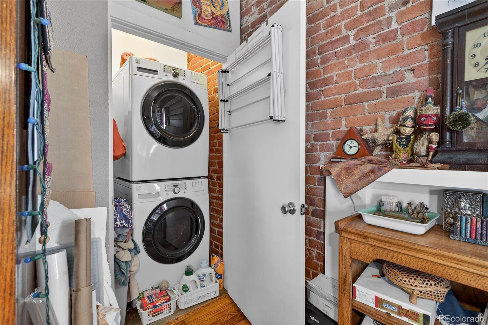 352 Bannock Street Denver, CO 80223 - Photo 7 of 43 a utility room with dryer and washer