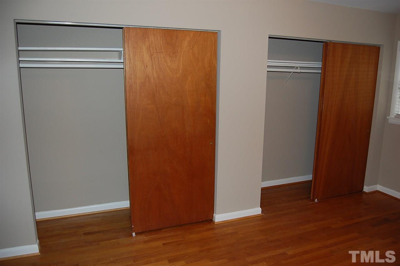 3214 Cyanne Circle Raleigh, NC 27606 - Photo 11 of 21 a view of an empty room with wooden floor and closet