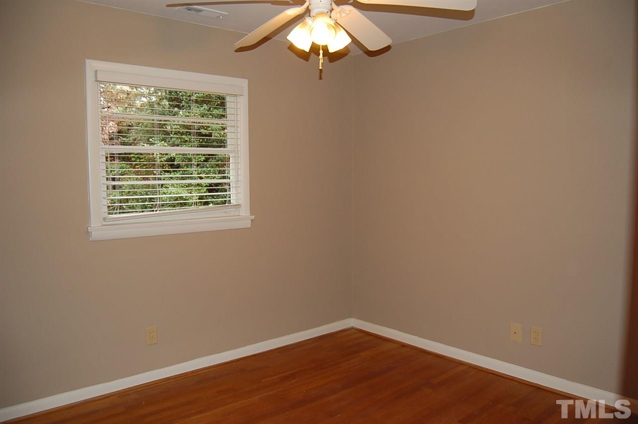 3214 Cyanne Circle Raleigh, NC 27606 - Photo 15 of 21 a view of a small space with wooden floor and a window