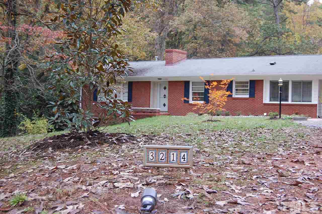 3214 Cyanne Circle Raleigh, NC 27606 - Photo 3 of 21 a front view of a house with garden