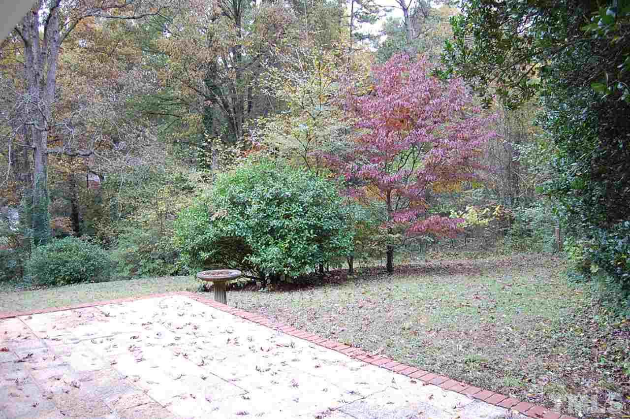 3214 Cyanne Circle Raleigh, NC 27606 - Photo 5 of 21 a backyard of a house with lots of green space