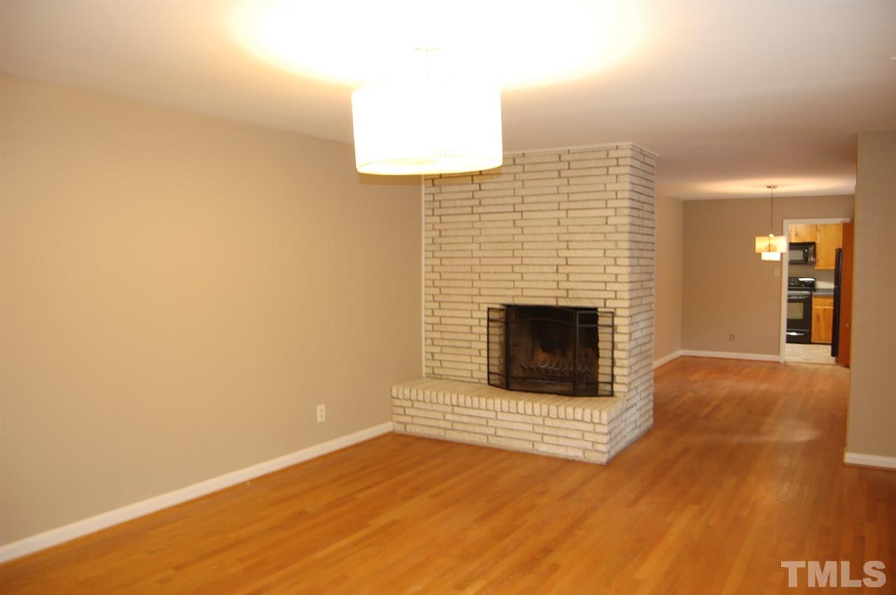3214 Cyanne Circle Raleigh, NC 27606 - Photo 9 of 21 a view of a livingroom with a fireplace