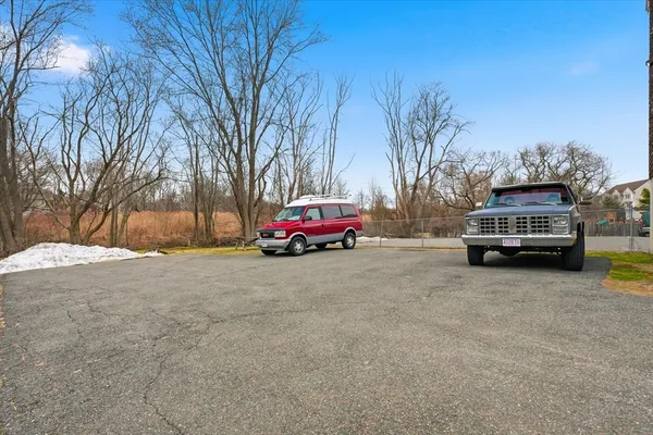 a car parked in front of a house