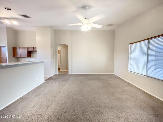a view of a kitchen with a sink and cabinet