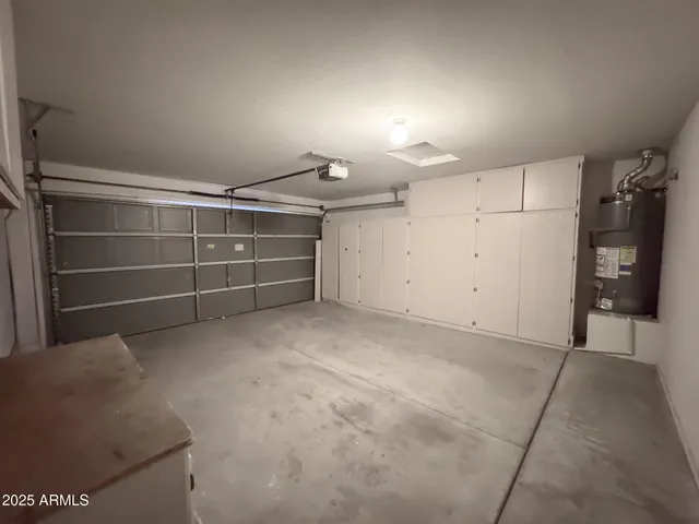 a view of an empty room with closet