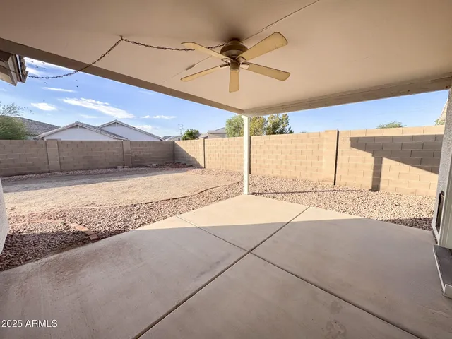a view of a backyard of a house