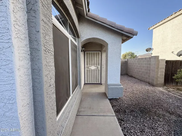 a view of a house with a pathway