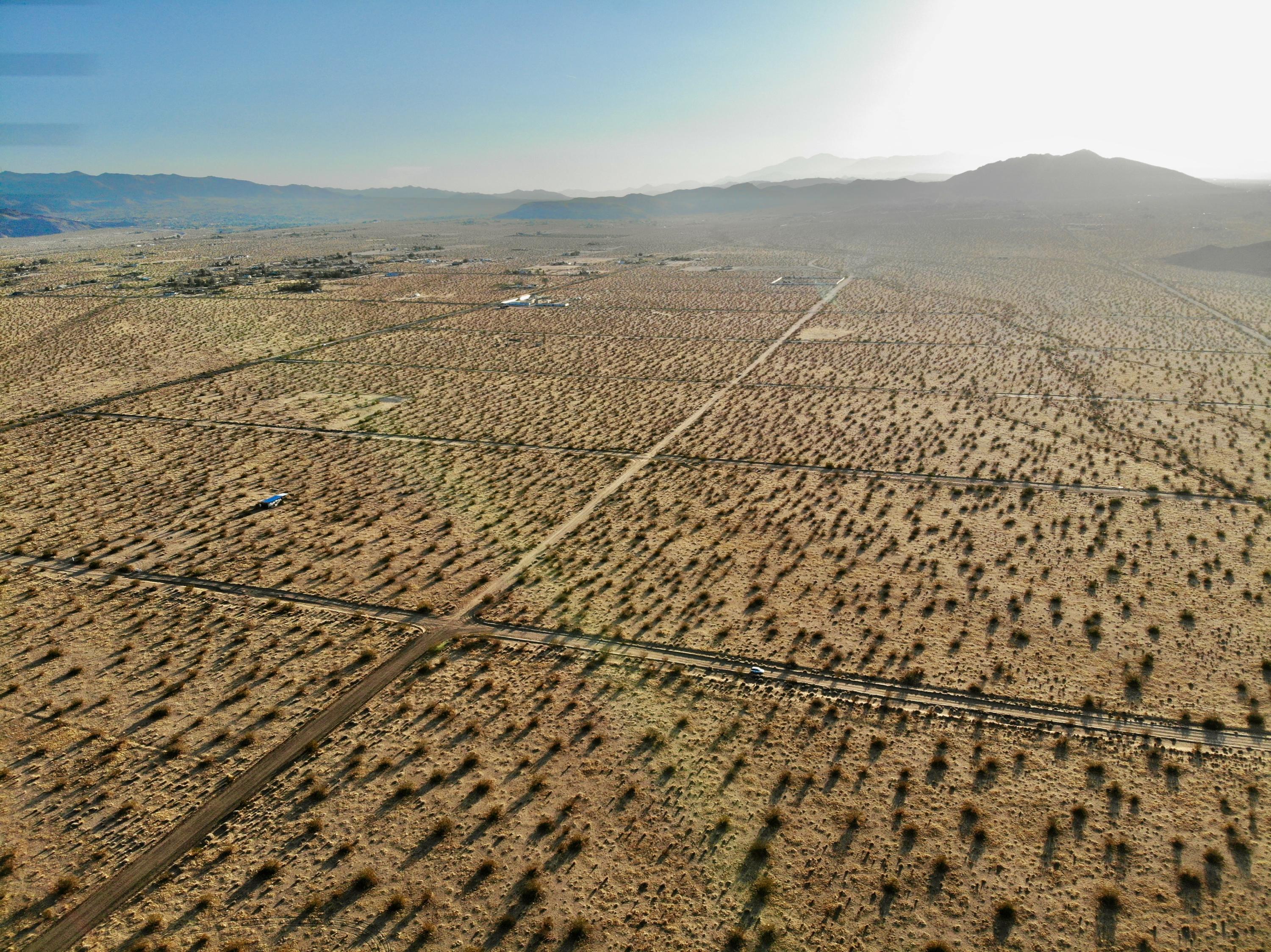 212 Sunever Road Joshua Tree, CA 92252 - Photo 8 of 28 a view of an ocean and a mountain