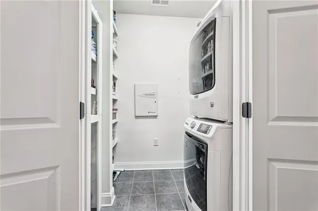 a kitchen with a washer and dryer