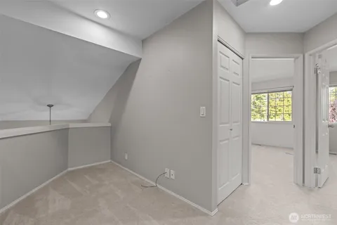 a bathroom with a toilet sink and a mirror