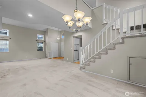 a view of an entryway with a chandelier