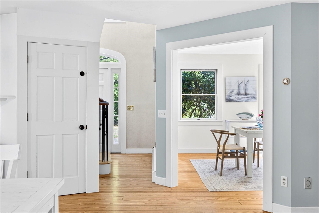 80 Log Cabin Road Eastham, MA 02642 - Photo 14 of 41 a view of a hallway with wooden floor and a window