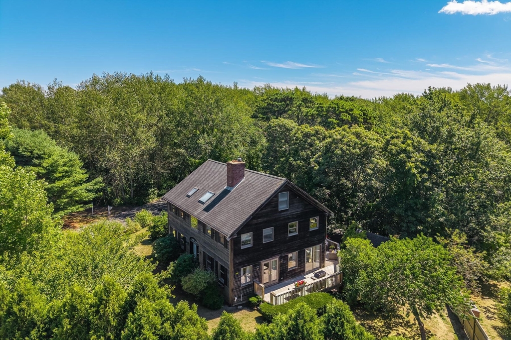 80 Log Cabin Road Eastham, MA 02642 - Photo 2 of 41 an aerial view of a house with a yard