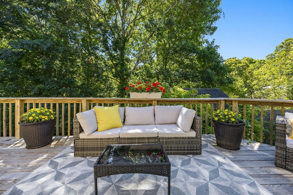 80 Log Cabin Road Eastham, MA 02642 - Photo 22 of 41 a view of a deck with a patio