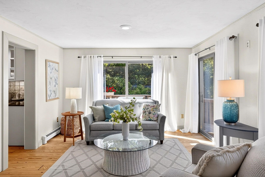 80 Log Cabin Road Eastham, MA 02642 - Photo 24 of 41 a living room with furniture and a window