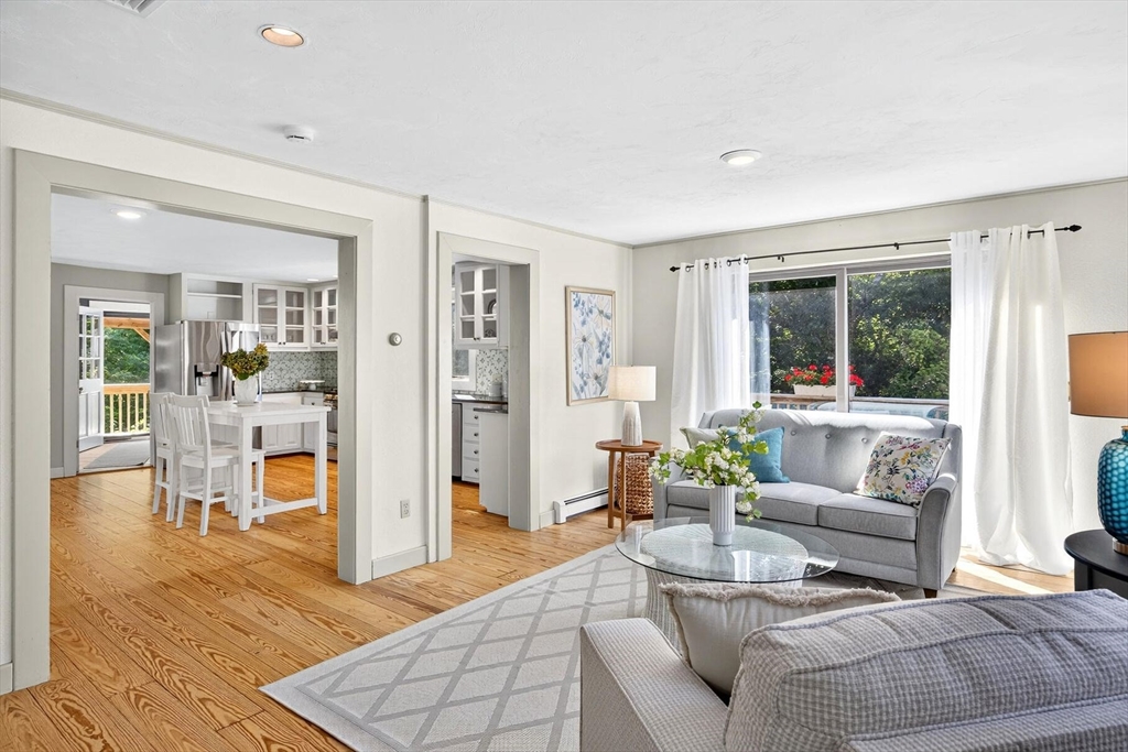 80 Log Cabin Road Eastham, MA 02642 - Photo 25 of 41 a living room with furniture and a table