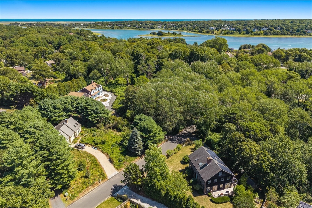 80 Log Cabin Road Eastham, MA 02642 - Photo 4 of 41 an aerial view of a house with a yard