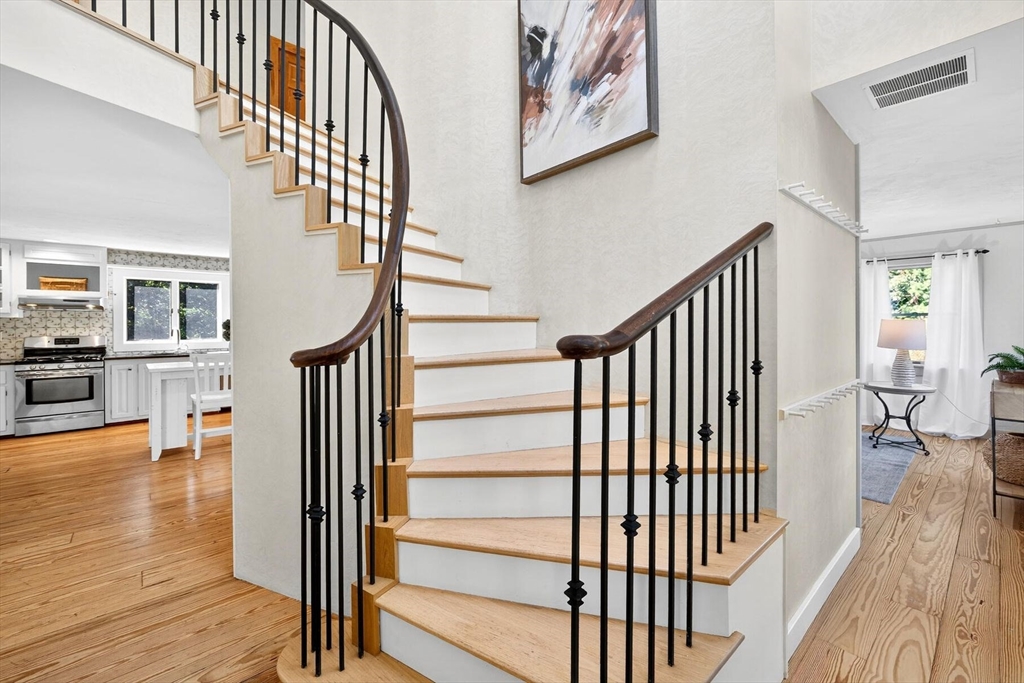 80 Log Cabin Road Eastham, MA 02642 - Photo 5 of 41 a view of entryway and hall with wooden floor