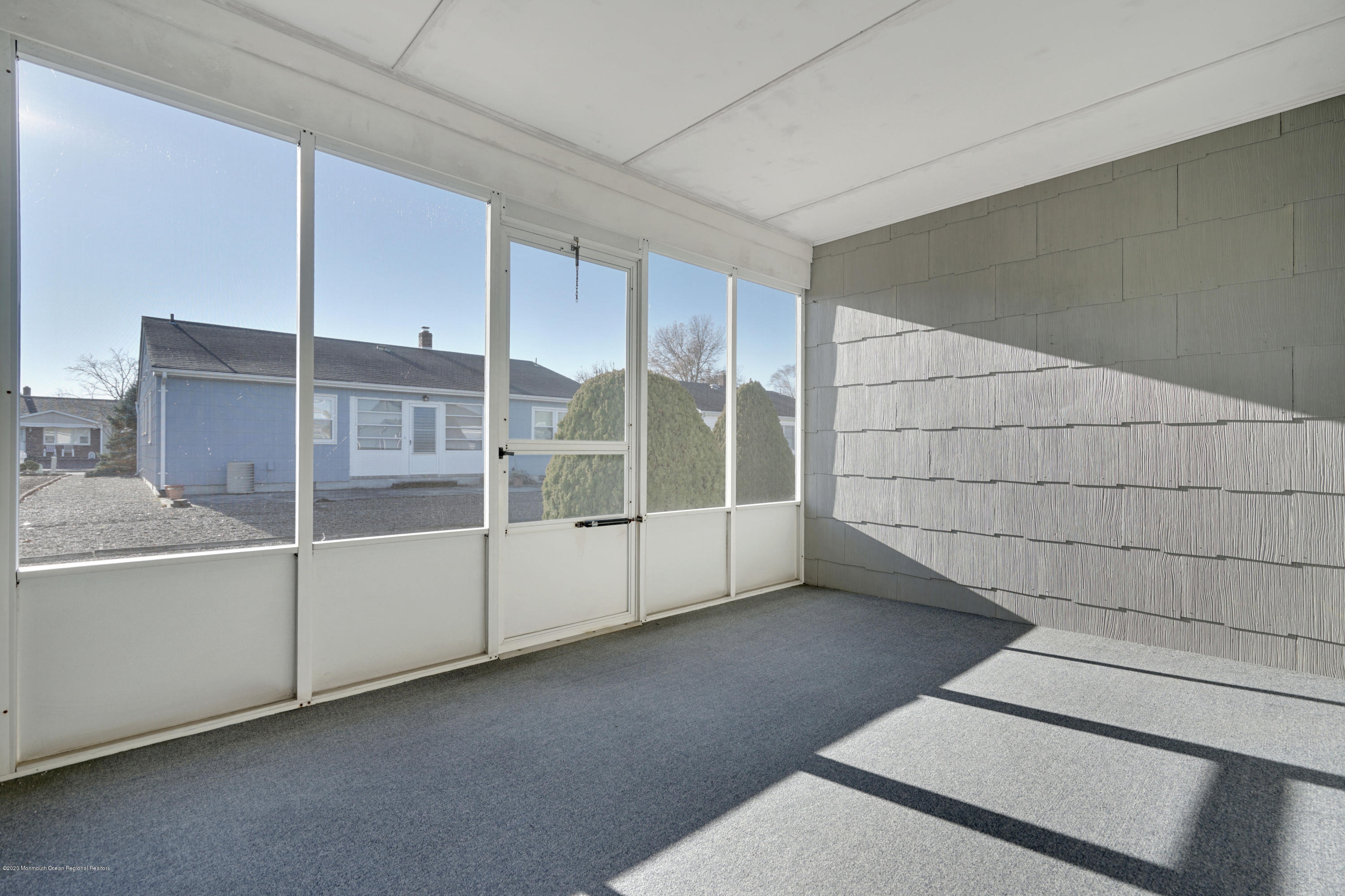 18 Mapleton Road Toms River, NJ 08757 - Photo 16 of 18 a view of an empty room with glass door