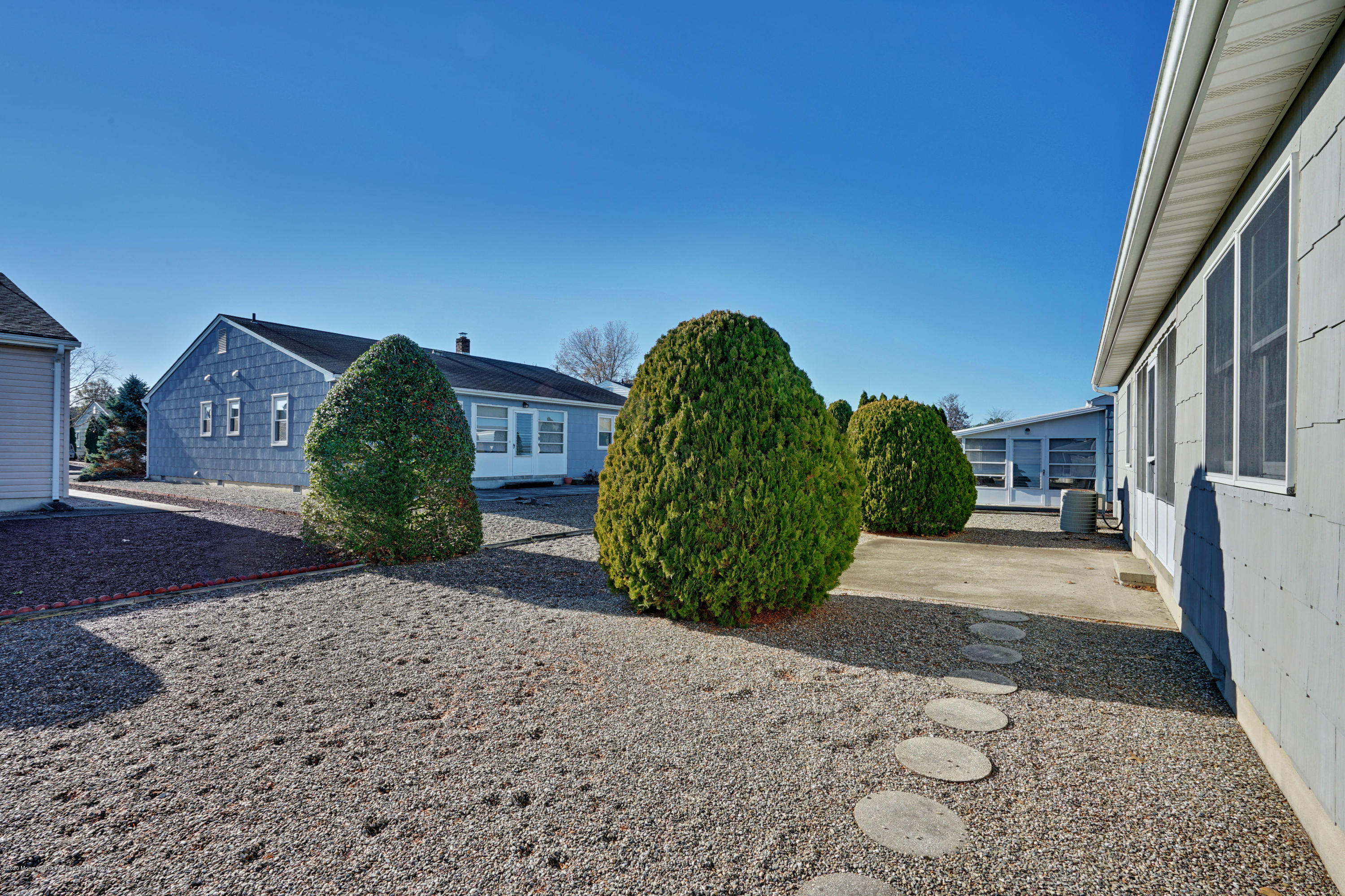 18 Mapleton Road Toms River, NJ 08757 - Photo 17 of 18 a view of a garden with a pathway