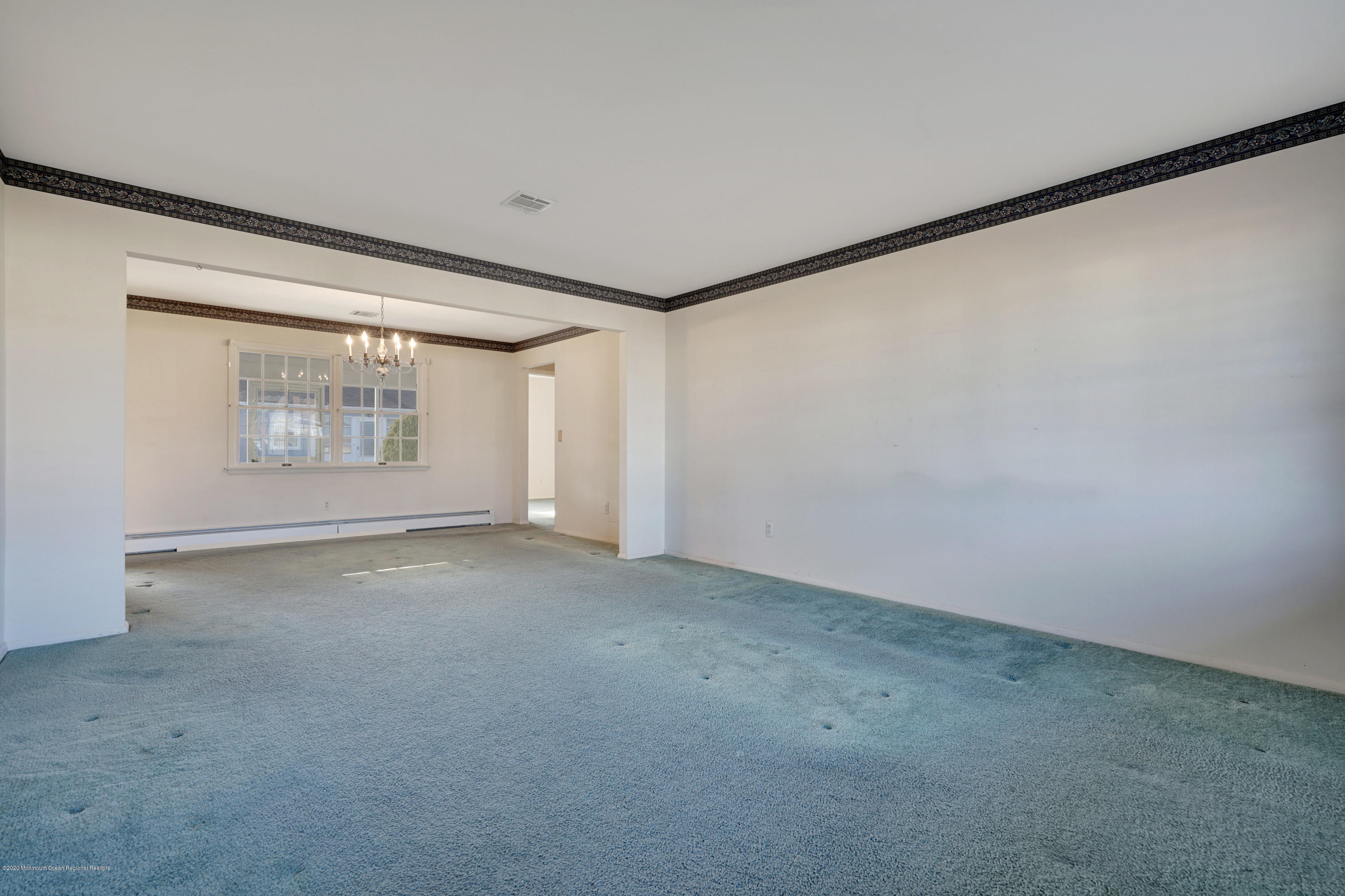 18 Mapleton Road Toms River, NJ 08757 - Photo 3 of 18 a view of an empty room with a window