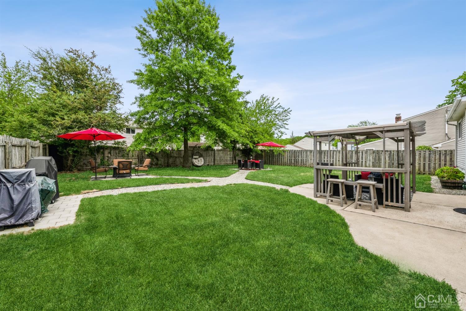 1341 Seneca Road North Brunswick, NJ 08902 - Photo 20 of 23 Backyard oasis with multiple entertaining areas