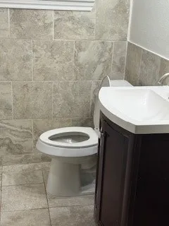 a bathroom with a sink and toilet