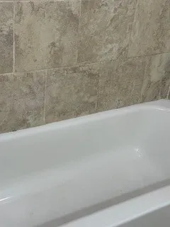 a view of a bathtub in a bathroom