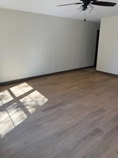 a view of an empty room and window