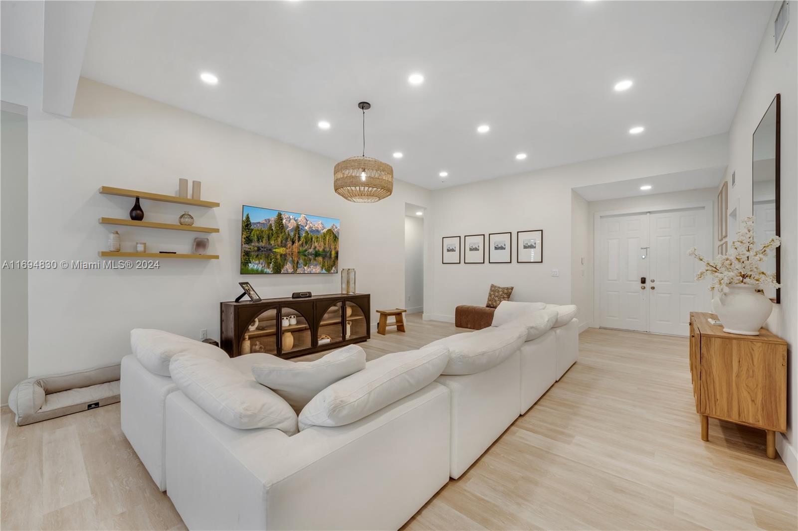 16429 Southwest 54th Terrace Miami, FL 33185 - Photo 7 of 28 a living room with furniture