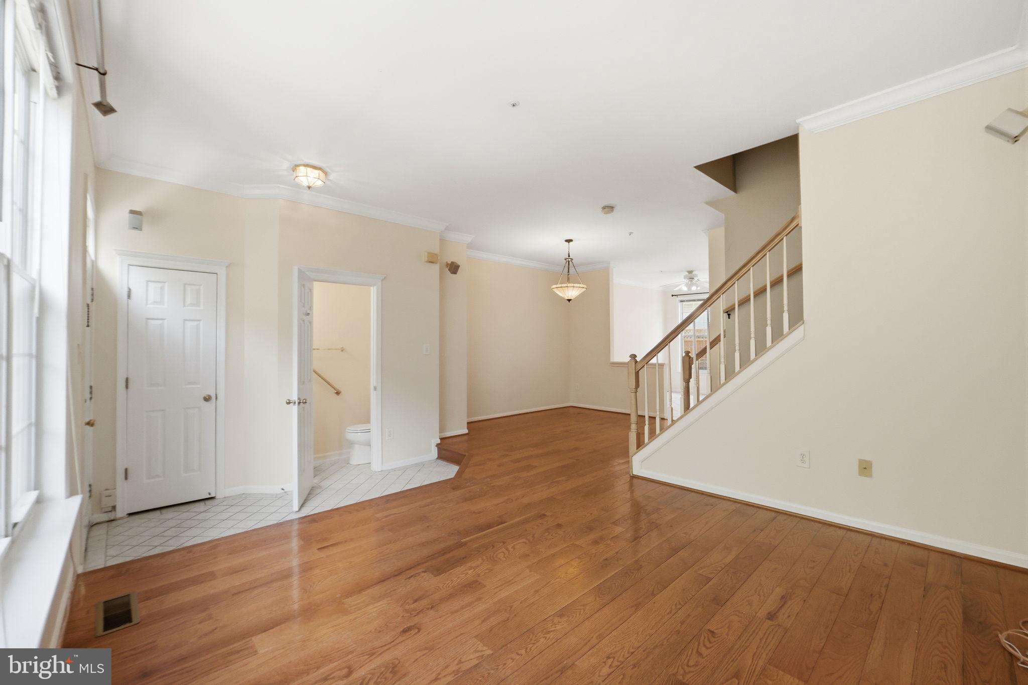 9702 Athletic Way Gaithersburg, MD 20878 - Photo 12 of 29 a view of entryway with wooden floor