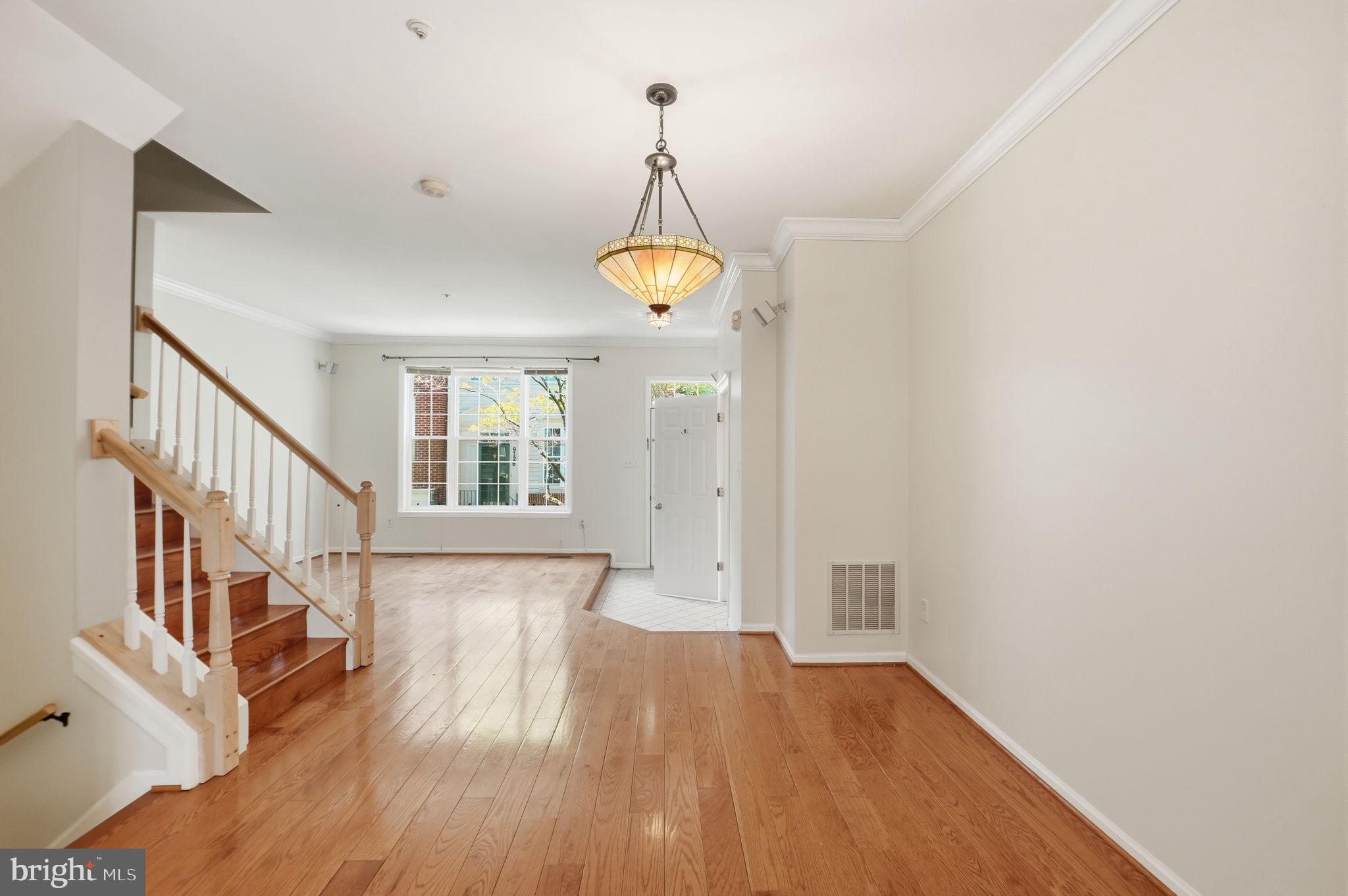 9702 Athletic Way Gaithersburg, MD 20878 - Photo 14 of 29 a view of entryway with wooden floor