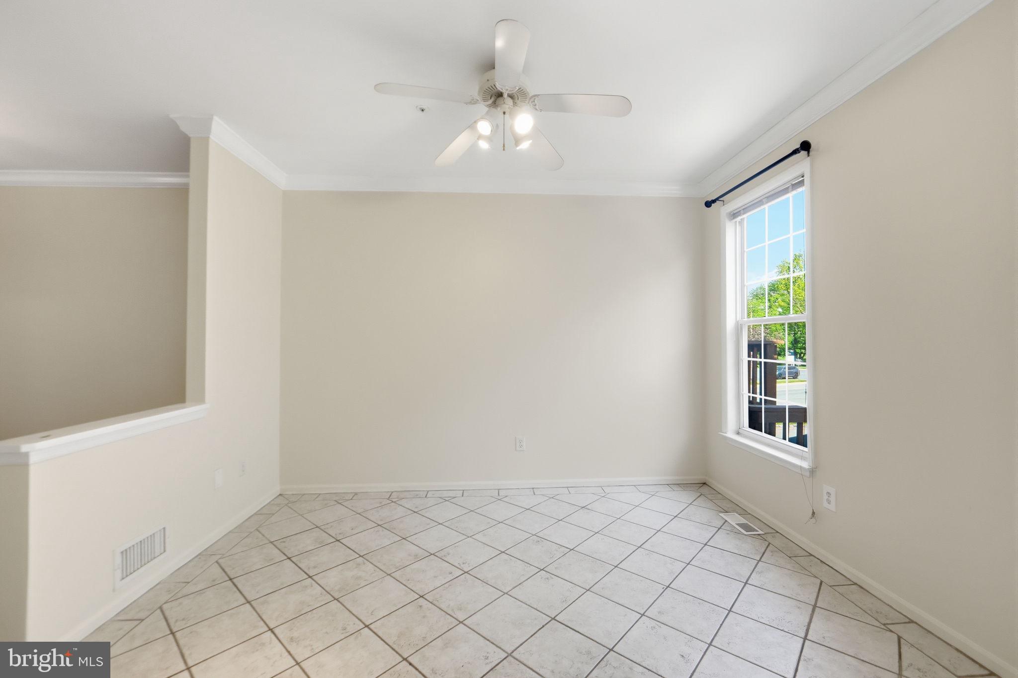 9702 Athletic Way Gaithersburg, MD 20878 - Photo 19 of 29 a view of an empty room with window