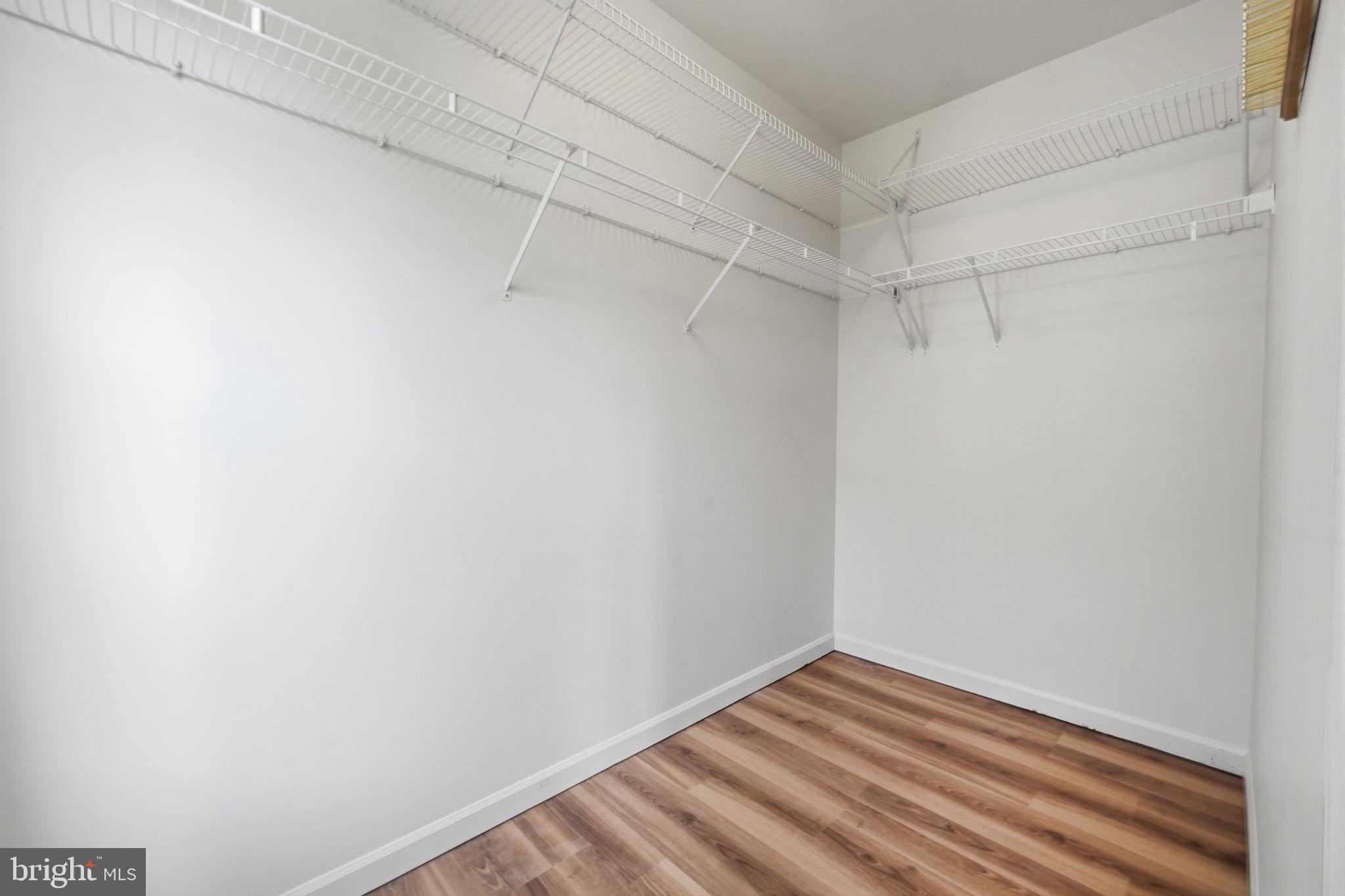 9702 Athletic Way Gaithersburg, MD 20878 - Photo 23 of 29 a view of a room with racks on the wall