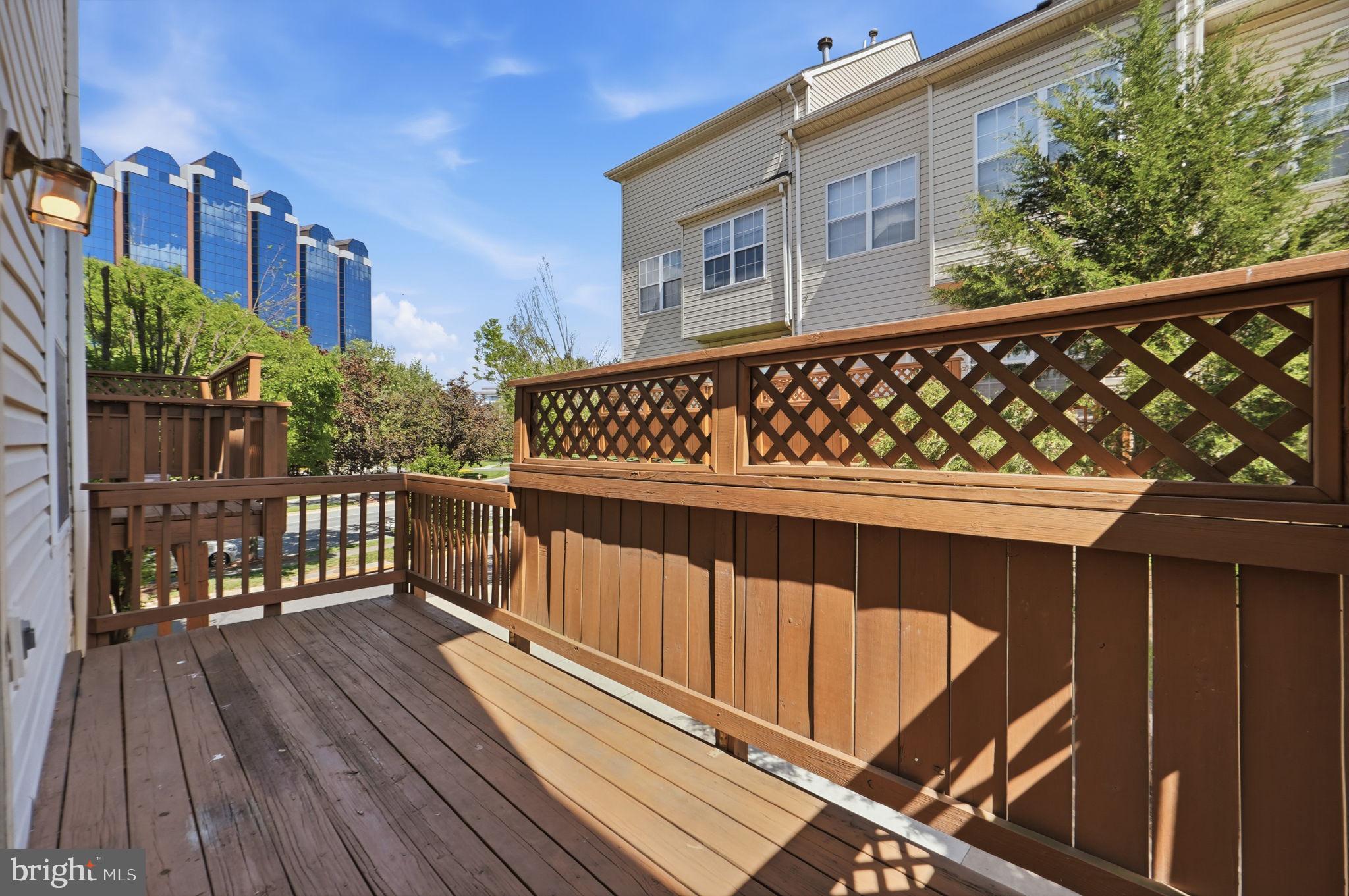 9702 Athletic Way Gaithersburg, MD 20878 - Photo 29 of 29 a view of wooden balcony with furniture