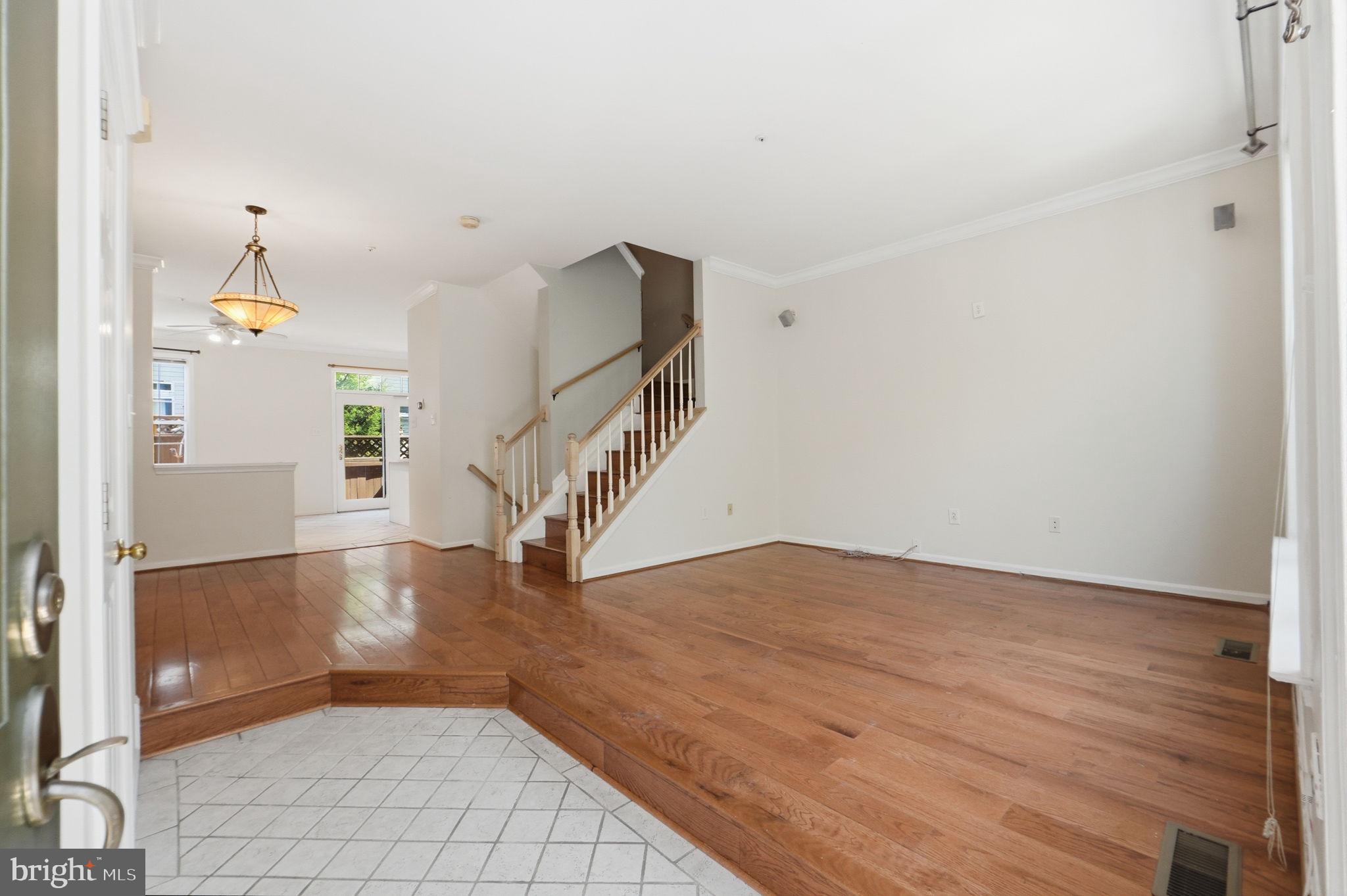 9702 Athletic Way Gaithersburg, MD 20878 - Photo 6 of 29 a view of entryway and hall with wooden floor
