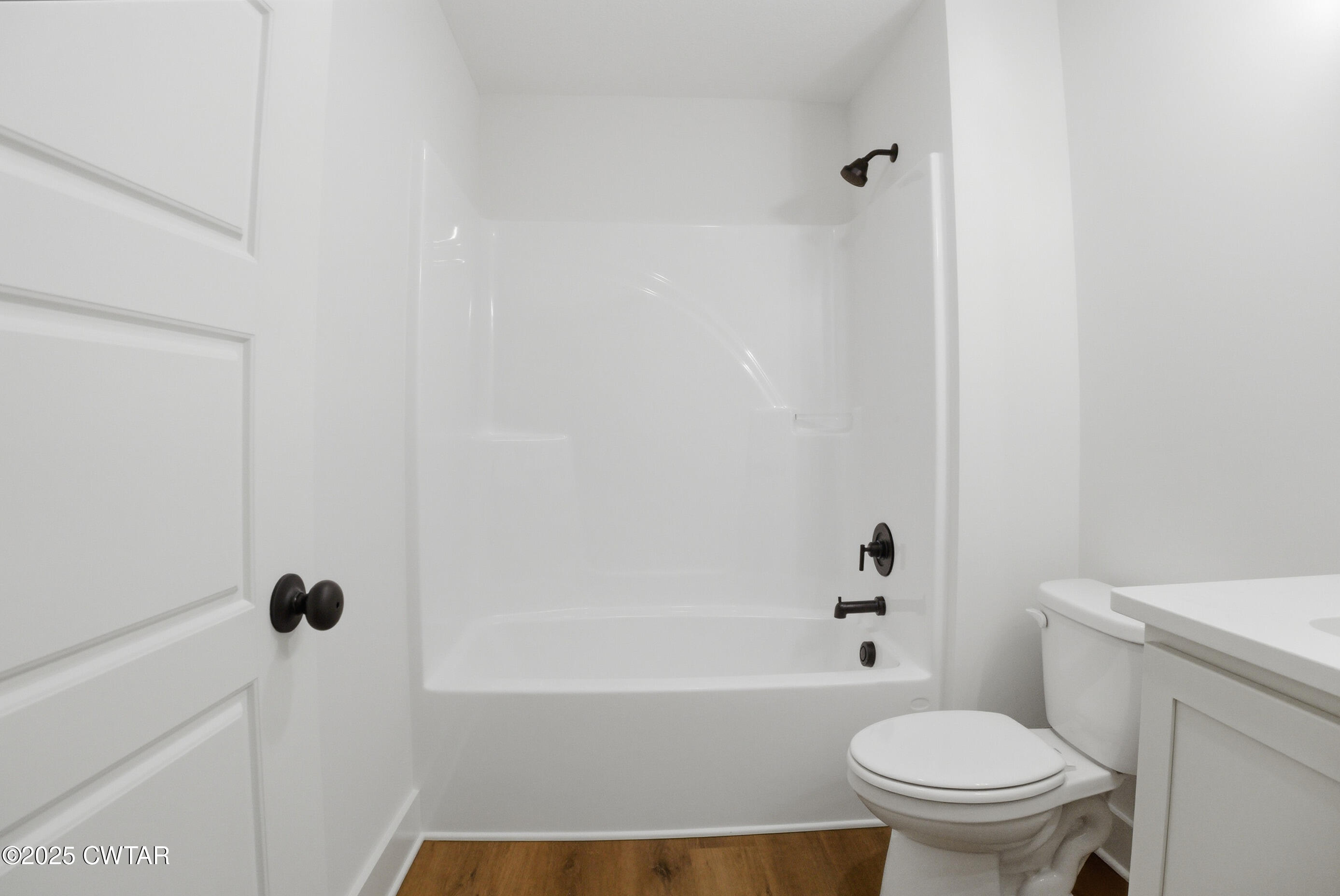 164 Daybreak Loop Medina, TN 38355 - Photo 32 of 40 a bathroom with a toilet and a tub